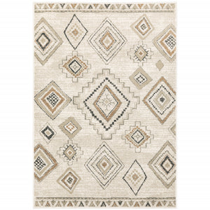 6' X 9' Ivory Orange Tan Black And Grey Southwestern Power Loom Stain Resistant Area Rug