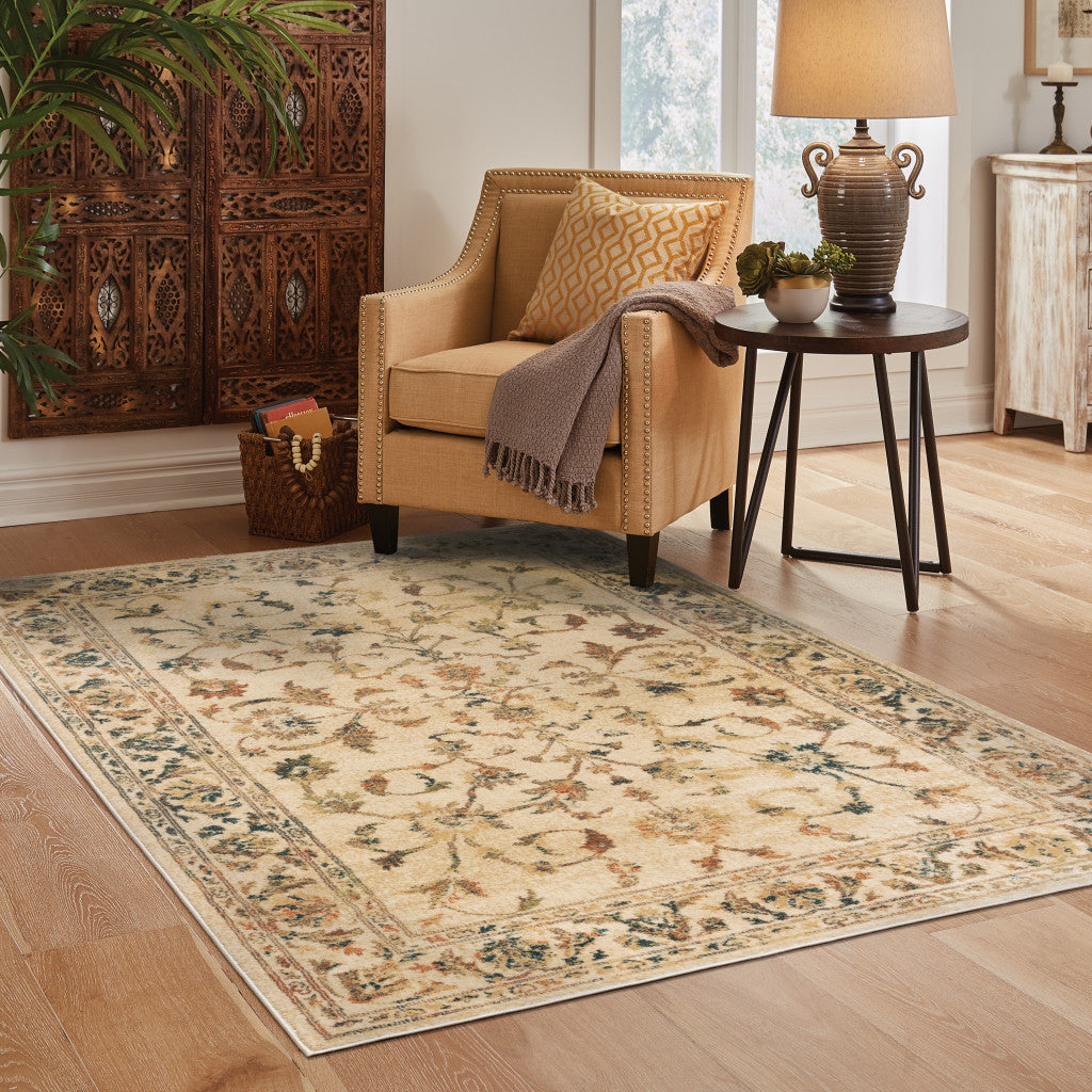 6' X 9' Beige Gold And Teal Oriental Power Loom Stain Resistant Area Rug