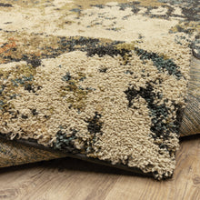 4' X 6' Beige Charcoal Teal And Moss Green Abstract Power Loom Stain Resistant Area Rug