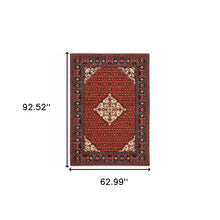 5' X 8' Red Blue Ivory And Orange Oriental Power Loom Stain Resistant Area Rug With Fringe