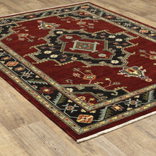 5' X 8' Red Black Beige And Blue Oriental Power Loom Stain Resistant Area Rug With Fringe