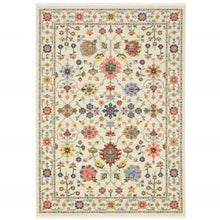5' X 8' Ivory Salmon Pink Gold Blues Grey Rust And Green Oriental Power Loom Stain Resistant Area Rug With Fringe