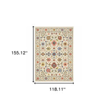 10' X 13' Ivory Salmon Pink Gold Blues Grey Rust And Green Oriental Power Loom Stain Resistant Area Rug With Fringe