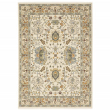2' X 6' Ivory Grey Orange Green Blue And Red Oriental Power Loom Stain Resistant Runner Rug With Fringe
