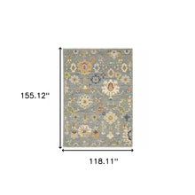 10' X 13' Grey Ivory Gold Salmon Red Blue And Green Oriental Power Loom Stain Resistant Area Rug With Fringe