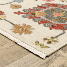 3' X 5' Ivory Yellow Rust Green Grey Pink Orange Blue And Grey Oriental Power Loom Stain Resistant Area Rug With Fringe