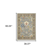 Blue Grey Gold Green Pink Orange Ivory And Red Oriental Power Loom Stain Resistant Area Rug With Fringe 3' X 5'