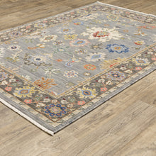 Blue Grey Gold Green Pink Orange Ivory And Red Oriental Power Loom Stain Resistant Area Rug With Fringe 6' X 9'