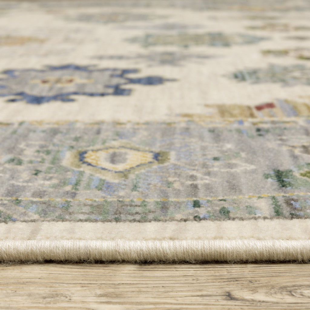 2' X 6' Ivory Blue Grey Teal Gold Green And Rust Oriental Power Loom Stain Resistant Runner Rug With Fringe