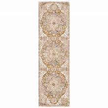 2' X 8' Gold And Ivory Oriental Power Loom Stain Resistant Runner Rug With Fringe