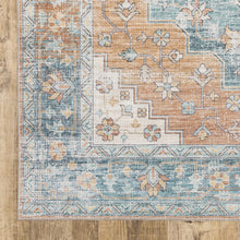 Orange Blue Teal Green And Beige Oriental Power Loom Stain Resistant Area Rug - 8' x 10'