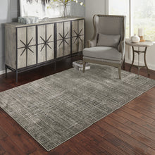 6' X 9' Charcoal Grey Grey Ivory Tan And Brown Abstract Power Loom Stain Resistant Area Rug