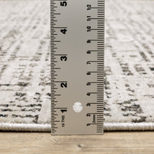 2' X 8' Ivory Grey Charcoal Brown And Beige Abstract Power Loom Stain Resistant Runner Rug