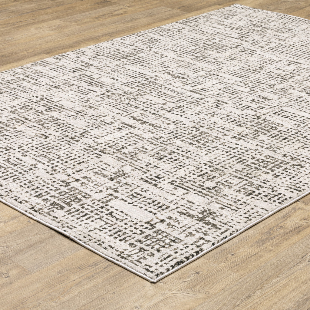 6' X 9' Ivory Grey Charcoal Brown And Beige Abstract Power Loom Stain Resistant Area Rug