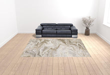 10' X 13' Ivory Tan Beige Grey And Brown Abstract Power Loom Stain Resistant Area Rug