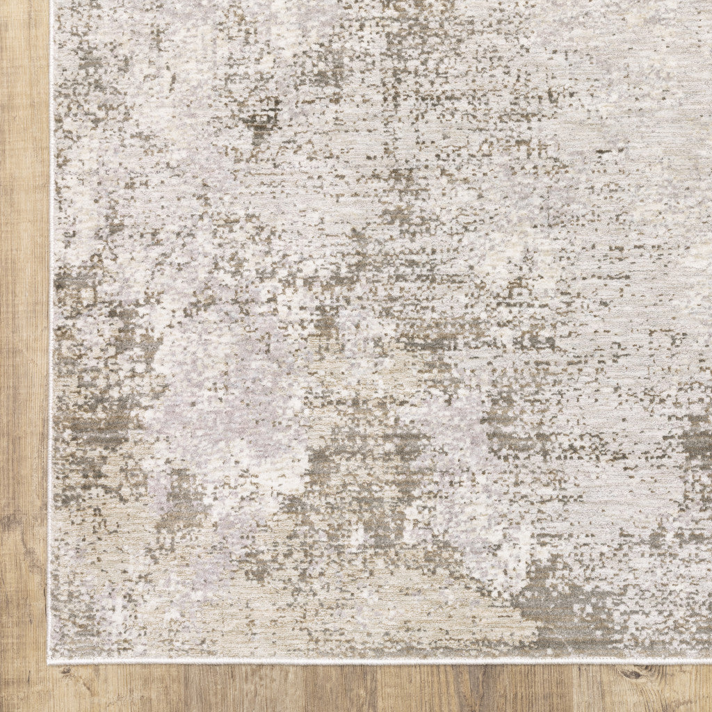 6' X 9' Beige Ivory Tan Grey And Brown Abstract Power Loom Stain Resistant Area Rug