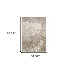 3' X 5' Ivory Grey Tan Brown And Beige Abstract Power Loom Stain Resistant Area Rug