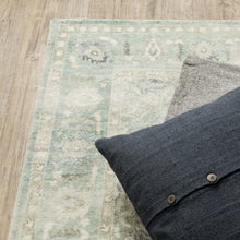 2' X 8' Green And Ivory Oriental Power Loom Stain Resistant Runner Rug