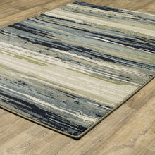 8' X 10' Blue Green Grey Light Blue And Beige Abstract Power Loom Stain Resistant Area Rug