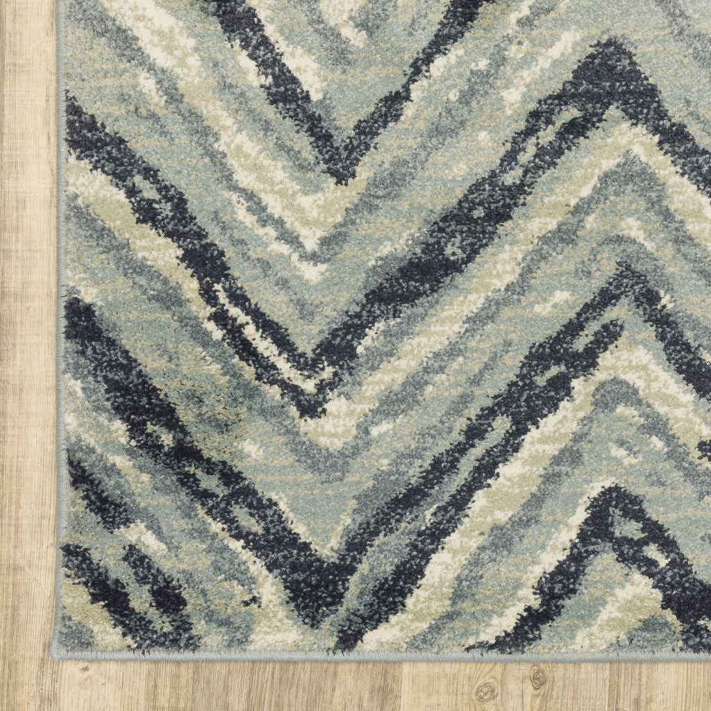 6' X 9' Blue Ivory Grey Beige And Light Blue Geometric Power Loom Stain Resistant Area Rug