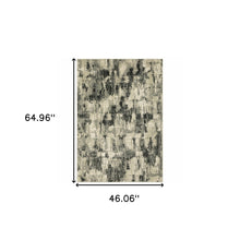 4' X 6' Grey Beige Charcoal And Blue Abstract Power Loom Stain Resistant Area Rug