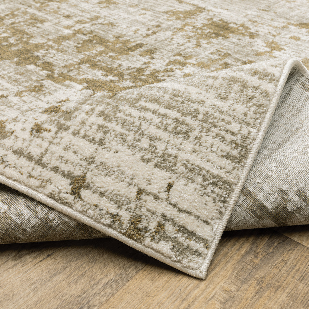6' X 9' Beige Gold And Grey Abstract Power Loom Stain Resistant Area Rug