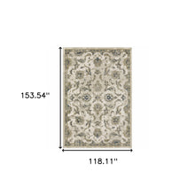10' X 13' Beige Gold Blue And Grey Oriental Power Loom Stain Resistant Area Rug