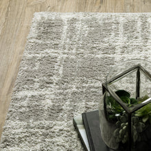 2' X 3' Grey And Ivory Abstract Shag Power Loom Stain Resistant Area Rug