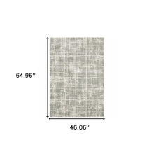 Grey And Ivory Abstract Shag Power Loom Stain Resistant Area Rug - 4' x 6'