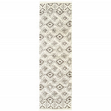 2' X 8' Ivory And Brown Geometric Shag Power Loom Stain Resistant Runner Rug