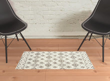 2' X 3' Ivory And Brown Geometric Shag Power Loom Stain Resistant Area Rug