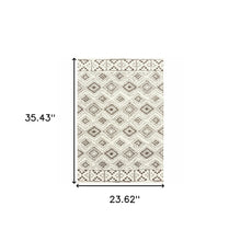 2' X 3' Ivory And Brown Geometric Shag Power Loom Stain Resistant Area Rug