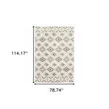6' X 9' Ivory And Brown Geometric Shag Power Loom Stain Resistant Area Rug