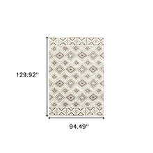 8' X 11' Ivory And Brown Geometric Shag Power Loom Stain Resistant Area Rug