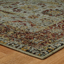 5' X 7' Blue Red Green And Gold Oriental Power Loom Stain Resistant Area Rug