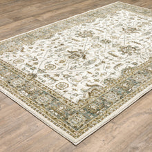 5' X 7' Ivory Grey And Blue Oriental Power Loom Stain Resistant Area Rug