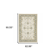 5' X 7' Ivory Grey And Blue Oriental Power Loom Stain Resistant Area Rug
