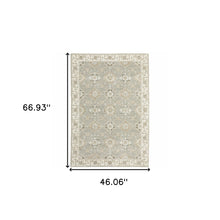 3' X 5' Grey Ivory Tan Brown And Gold Oriental Power Loom Stain Resistant Area Rug