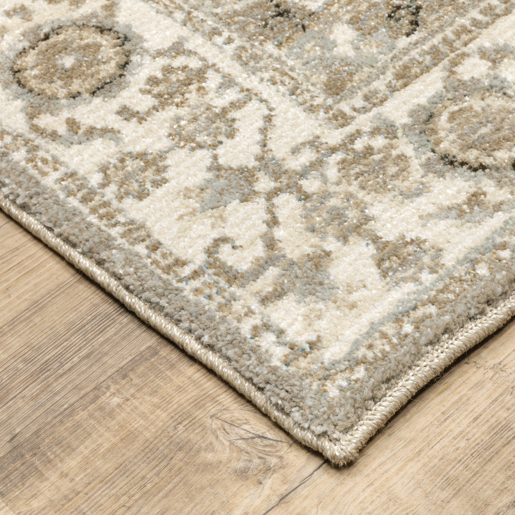 5' X 7' Grey Ivory Tan Brown And Gold Oriental Power Loom Stain Resistant Area Rug