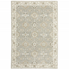 6' X 9' Grey Ivory Tan Brown And Gold Oriental Power Loom Stain Resistant Area Rug
