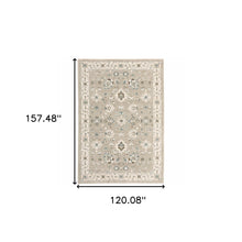 10' X 13' Beige Ivory Blue Green And Purple Oriental Power Loom Stain Resistant Area Rug