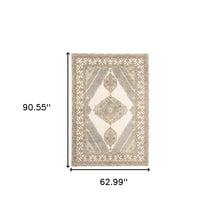 5' X 7' Beige And Ivory Oriental Power Loom Stain Resistant Area Rug