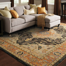 5' X 7' Gold Brown Grey Rust Green And Purple Oriental Power Loom Stain Resistant Area Rug