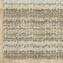 10' X 13' Ivory Grey Tan And Brown Abstract Power Loom Stain Resistant Area Rug