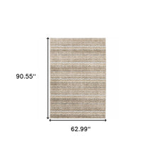 5' X 7' Ivory Grey Tan And Brown Abstract Power Loom Stain Resistant Area Rug