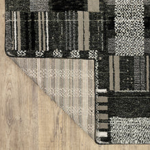 3' X 5' Black Grey And Ivory Geometric Power Loom Stain Resistant Area Rug