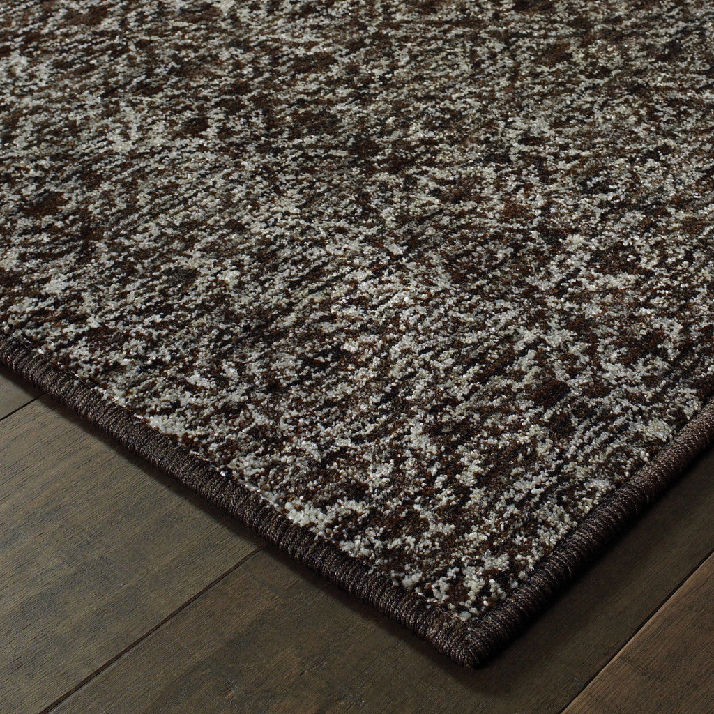 5' X 7' Charcoal Grey And Brown Geometric Power Loom Stain Resistant Area Rug