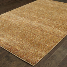 5' X 7' Gold Rust Brown Ivory Purple And Lavender Power Loom Stain Resistant Area Rug