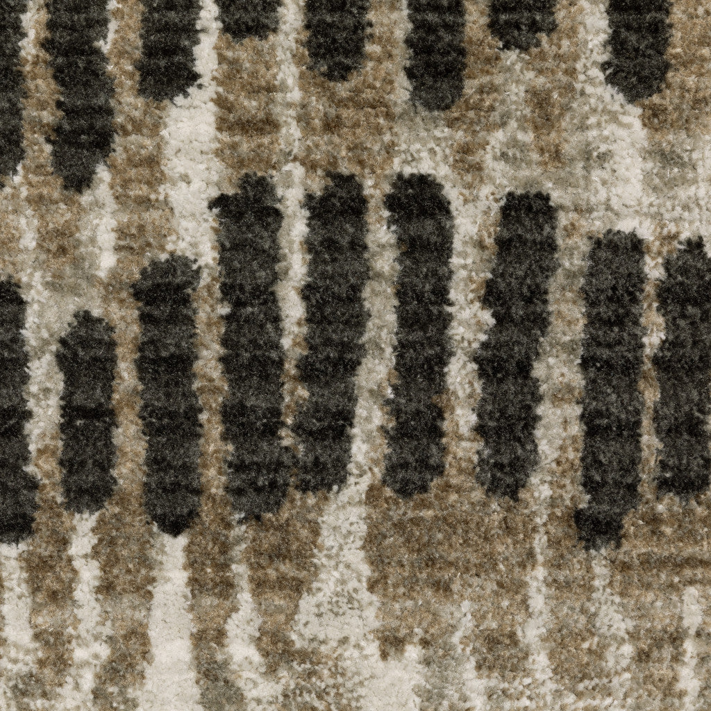 5' X 8' Beige Ivory Charcoal Brown Tan And Grey Abstract Power Loom Stain Resistant Area Rug With Fringe