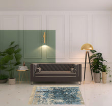 4' X 6' Blue Grey Ivory Light Blue And Dark Blue Abstract Power Loom Stain Resistant Area Rug With Fringe